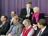 Host Jim Peck taking questions from studio audience members